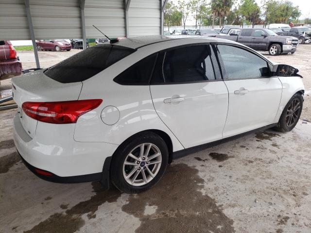 Photo 4 from auction – 2018 FORD FOCUS SE with VIN 1FADP3F21JL308257