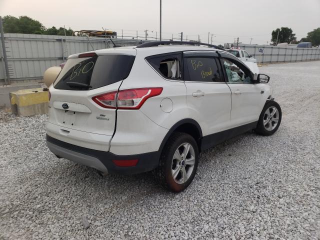 Photo 4 from auction – 2016 FORD ESCAPE SE with VIN 1FMCU0GX8GUA09449