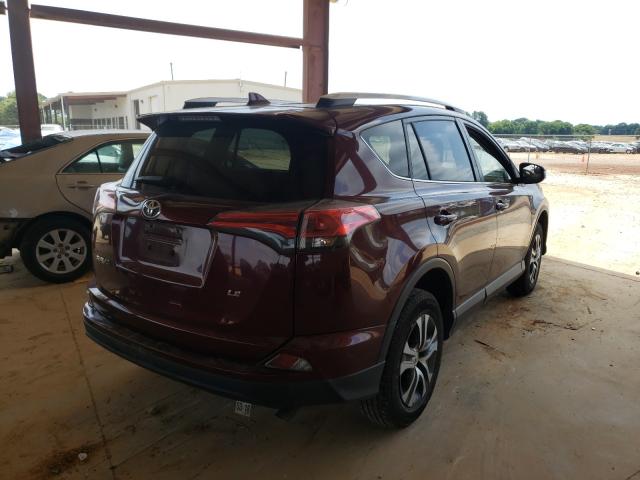 Photo 4 from auction – 2016 TOYOTA RAV4 LE with VIN JTMZFREV3GD084011