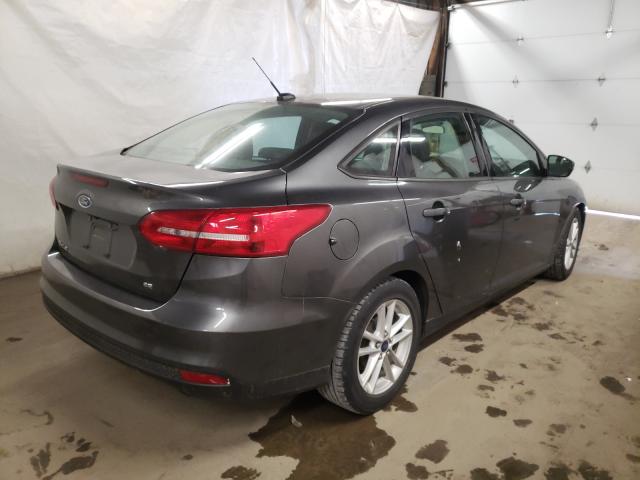 Photo 4 from auction – 2015 FORD FOCUS SE with VIN 1FADP3F29FL345922