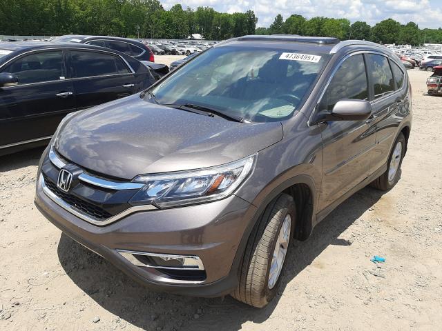 Photo 2 from auction – 2016 HONDA CR-V EXL with VIN 2HKRM3H70GH502258