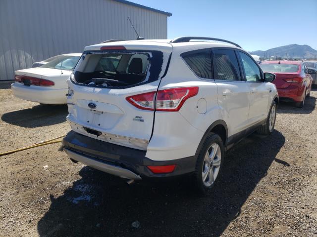 Photo 4 from auction – 2016 FORD ESCAPE SE with VIN 1FMCU9G92GUC05649