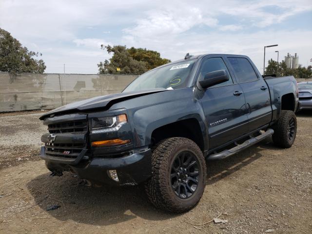 Photo 2 from auction – 2018 CHEVROLET SILVERADO with VIN 3GCUKREC0JG509621
