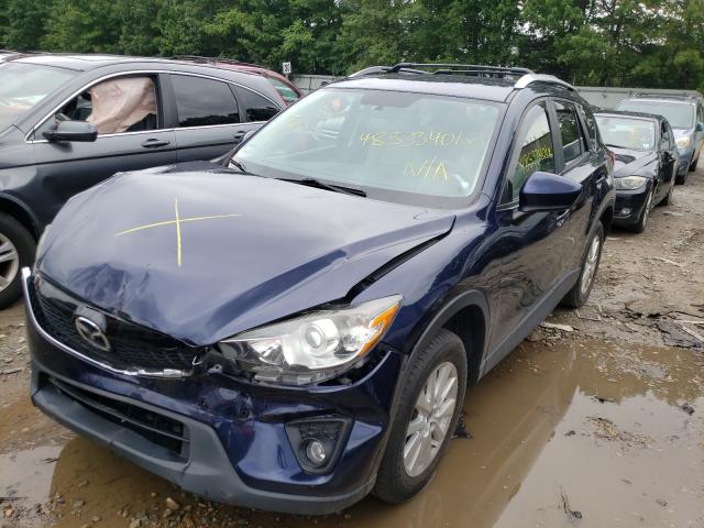 Photo 2 from auction – 2014 MAZDA CX-5 TOURI with VIN JM3KE4CYXE0327460