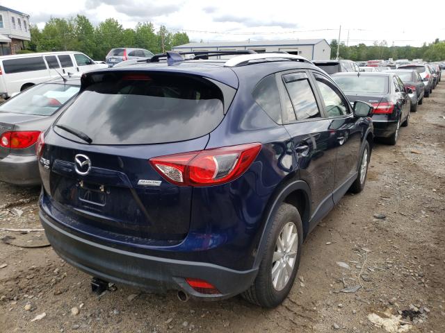 Photo 4 from auction – 2014 MAZDA CX-5 TOURI with VIN JM3KE4CYXE0327460