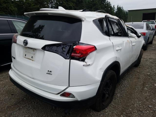 Photo 4 from auction – 2016 TOYOTA RAV4 LE with VIN JTMBFREV9GJ092360