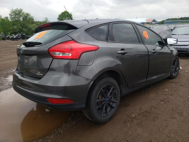 Photo 4 from auction – 2016 FORD FOCUS SE with VIN 1FADP3K29GL331638