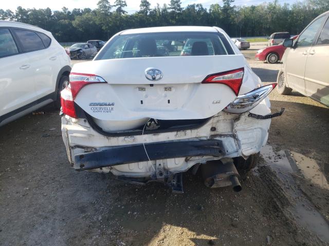 Photo 9 from auction – 2016 TOYOTA COROLLA L with VIN 5YFBURHE8GP490463
