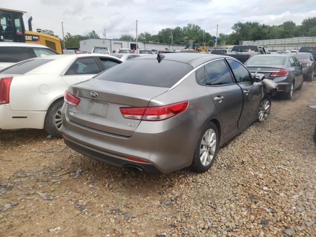 Photo 4 from auction – 2016 KIA OPTIMA EX with VIN 5XXGU4L39GG027755