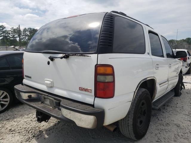 Photo 4 from auction – 2003 GMC YUKON with VIN 1GKEC13Z93J338271