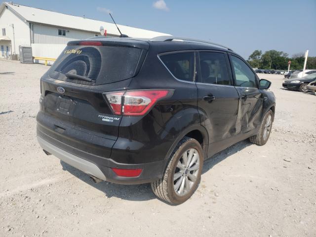 Photo 4 from auction – 2017 FORD ESCAPE TIT with VIN 1FMCU9J95HUB30746
