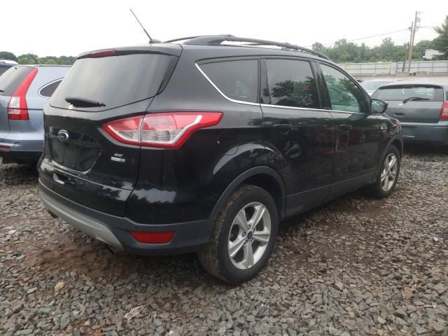 Photo 4 from auction – 2016 FORD ESCAPE SE with VIN 1FMCU9GX7GUA16722