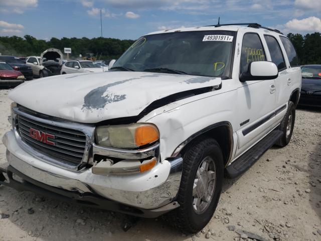 Photo 2 from auction – 2003 GMC YUKON with VIN 1GKEC13Z93J338271