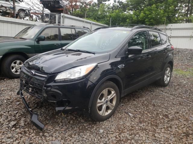 Photo 2 from auction – 2016 FORD ESCAPE SE with VIN 1FMCU9GX7GUA16722