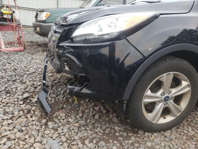 Photo 9 from auction – 2016 FORD ESCAPE SE with VIN 1FMCU9GX7GUA16722