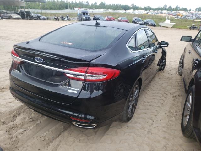 Photo 4 from auction – 2017 FORD FUSION TIT with VIN 3FA6P0K99HR148411