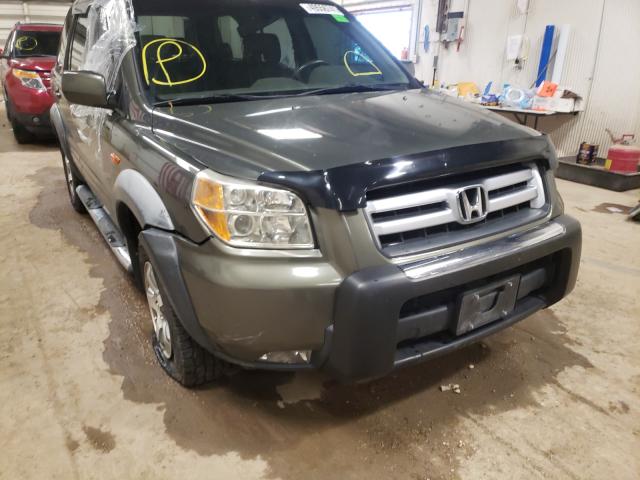 Photo 9 from auction – 2006 HONDA PILOT EX with VIN 2HKYF18586H519879