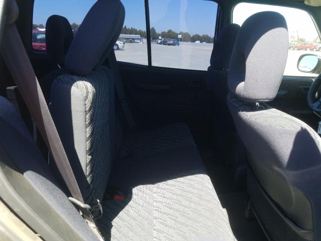 Photo 6 from auction – 1999 TOYOTA RAV4 with VIN JT3HP10V5X0211404
