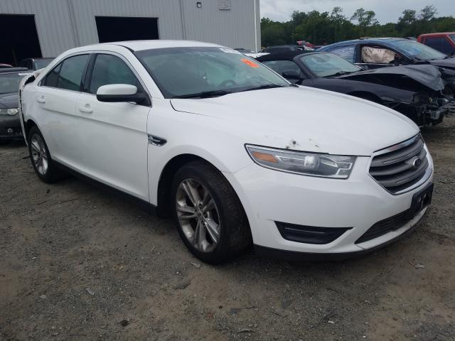 FORD TAURUS SEL 2013 with VIN 1FAHP2E84DG200617 - Photo from auction
