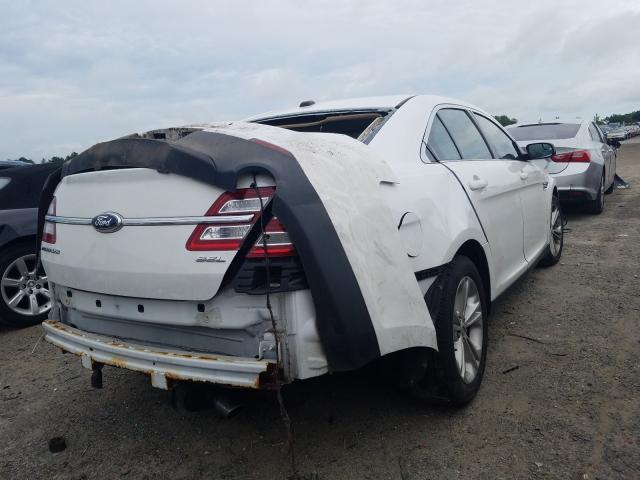 Photo 4 from auction – 2013 FORD TAURUS SEL with VIN 1FAHP2E84DG200617