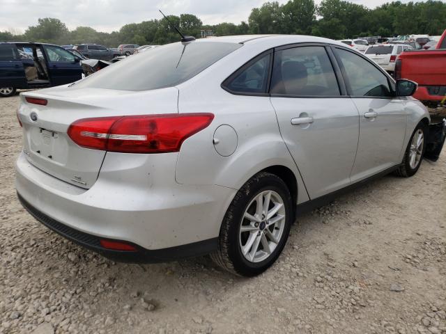 Photo 4 from auction – 2016 FORD FOCUS SE with VIN 1FADP3F29GL293497