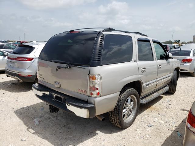 Photo 4 from auction – 2004 GMC YUKON with VIN 1GKEC13Z84J289369