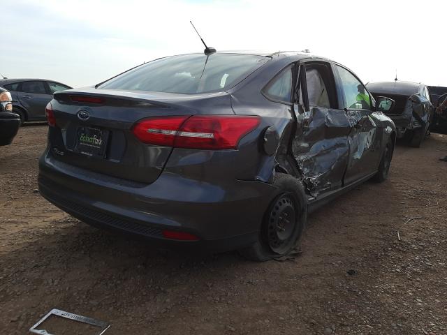 Photo 4 from auction – 2018 FORD FOCUS S with VIN 1FADP3E21JL205146