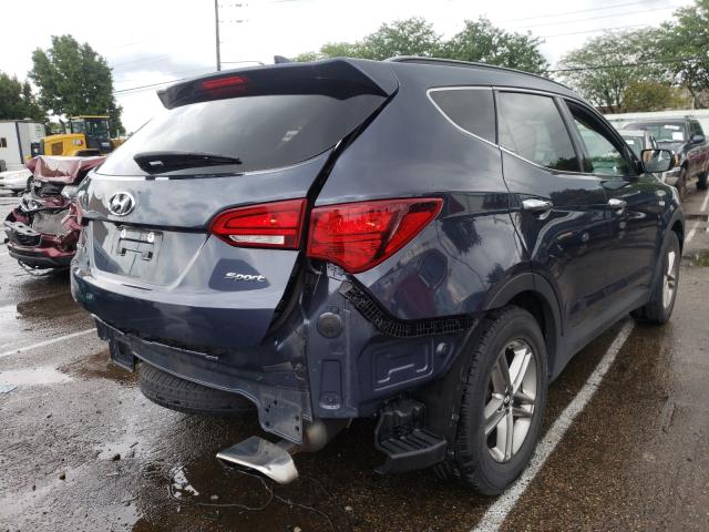Photo 4 from auction – 2018 HYUNDAI SANTA FE S with VIN 5NMZU3LB6JH068590