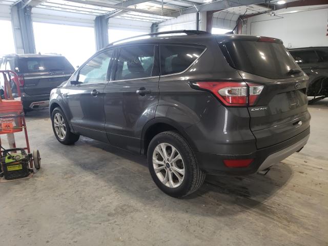 Photo 3 from auction – 2018 FORD ESCAPE SE with VIN 1FMCU9GD1JUA09763