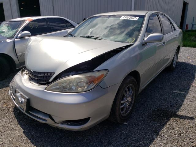 Photo 2 from auction – 2002 TOYOTA CAMRY LE with VIN JTDBE32K120066182