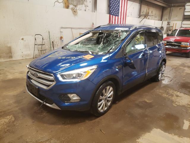 Photo 2 from auction – 2017 FORD ESCAPE TIT with VIN 1FMCU9J96HUC93468
