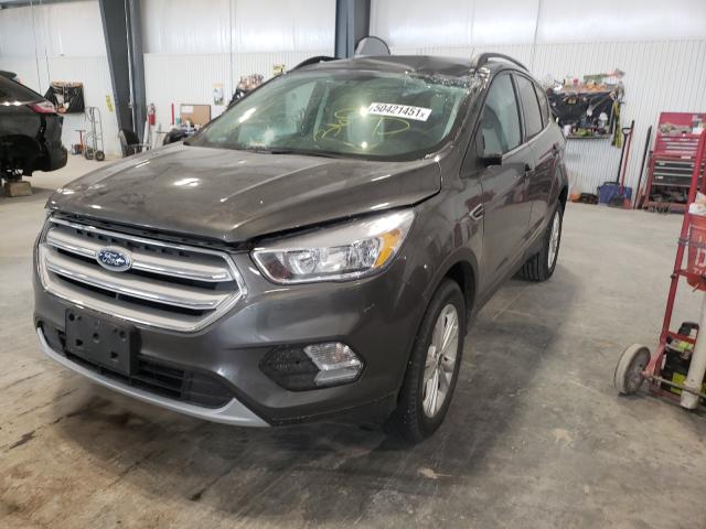 Photo 2 from auction – 2018 FORD ESCAPE SE with VIN 1FMCU9GD1JUA09763