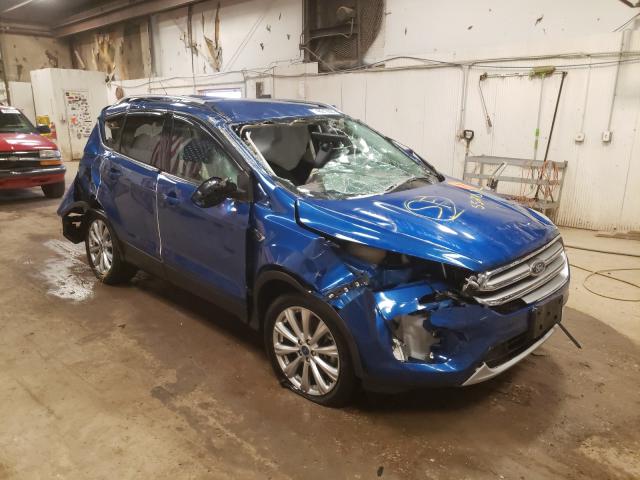 FORD ESCAPE TIT 2017 with VIN 1FMCU9J96HUC93468 - Photo from auction
