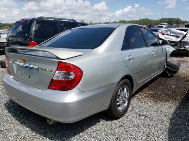 Photo 4 from auction – 2002 TOYOTA CAMRY LE with VIN JTDBE32K120066182