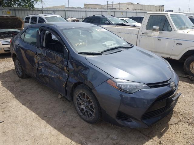TOYOTA COROLLA L 2017 with VIN 5YFBURHE1HP725495 - Photo from auction