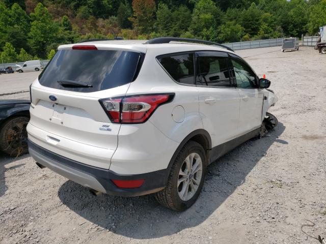 Photo 4 from auction – 2018 FORD ESCAPE SE with VIN 1FMCU9GD5JUA19485