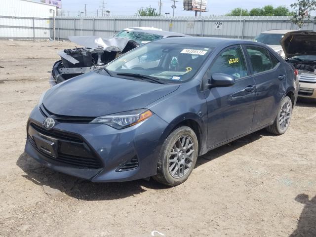 Photo 2 from auction – 2017 TOYOTA COROLLA L with VIN 5YFBURHE1HP725495