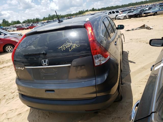 Photo 4 from auction – 2014 HONDA CR-V EXL with VIN 2HKRM3H79EH505804