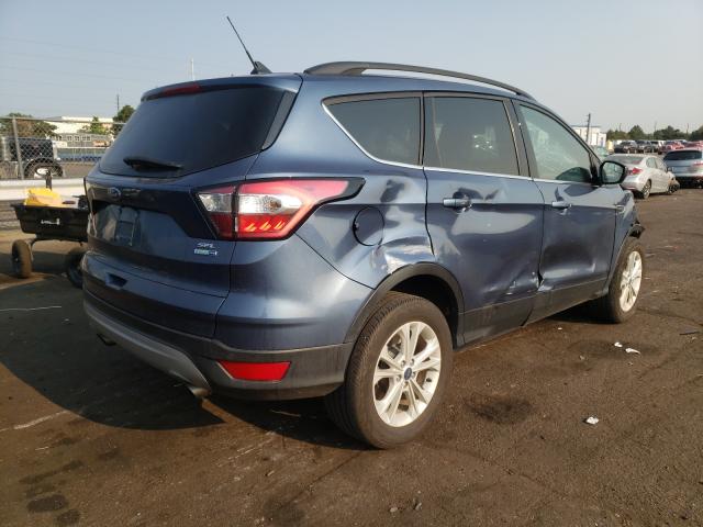 Photo 4 from auction – 2018 FORD ESCAPE SEL with VIN 1FMCU9HD8JUB54913