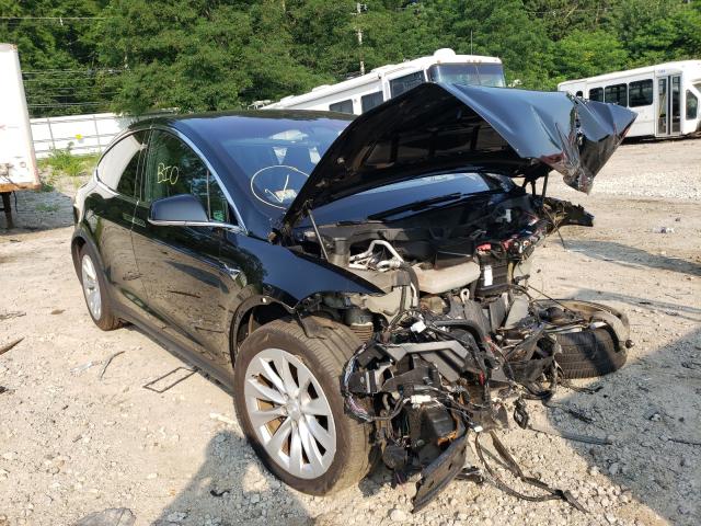 TESLA MODEL X 2018 with VIN 5YJXCDE2XJF088128 - Photo from auction