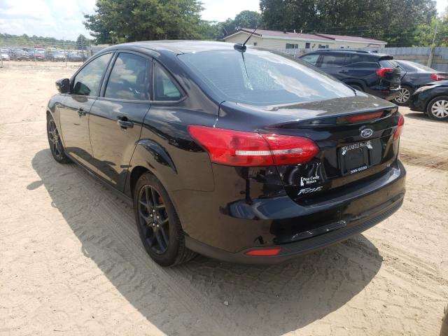 Photo 3 from auction – 2016 FORD FOCUS SE with VIN 1FADP3F20GL308632