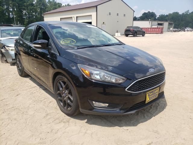 FORD FOCUS SE 2016 with VIN 1FADP3F20GL308632 - Photo from auction