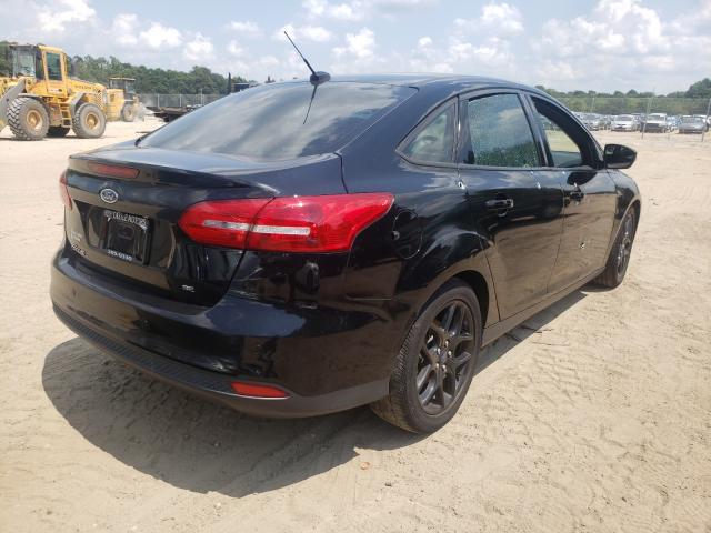 Photo 4 from auction – 2016 FORD FOCUS SE with VIN 1FADP3F20GL308632