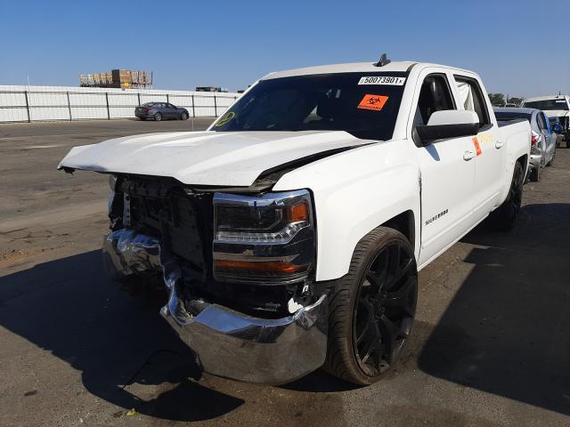 Photo 2 from auction – 2018 CHEVROLET SILVERADO with VIN 3GCPCREC5JG310476