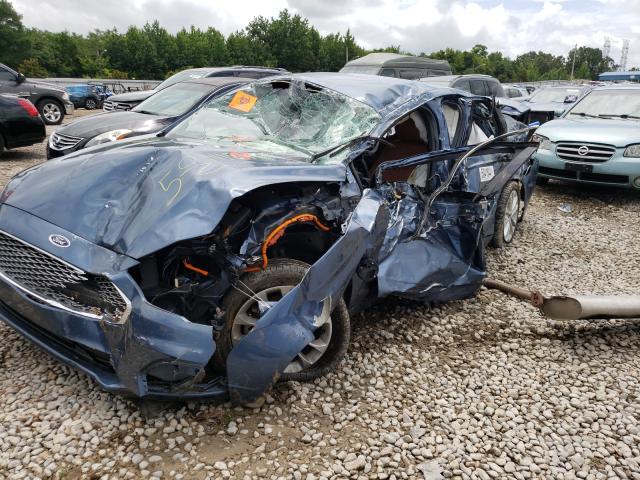 Photo 2 from auction – 2019 FORD FUSION TIT with VIN 3FA6P0SU2KR145006
