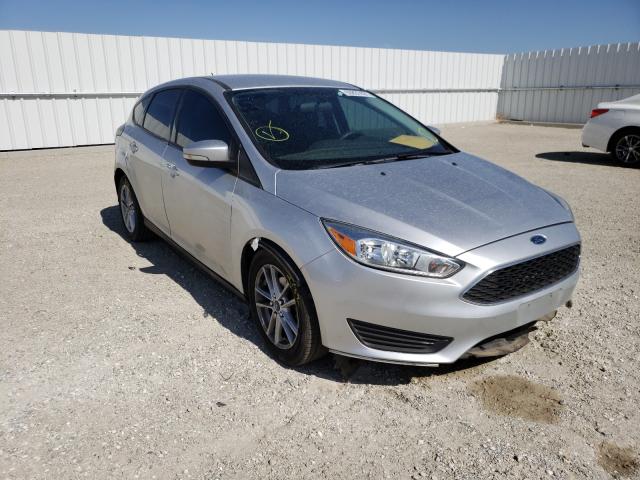 FORD FOCUS SE 2017 with VIN 1FADP3K21HL218025 - Photo from auction