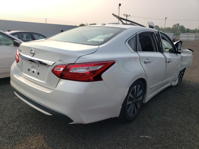 Photo 4 from auction – 2016 NISSAN ALTIMA 2.5 with VIN 1N4AL3AP2GC112225