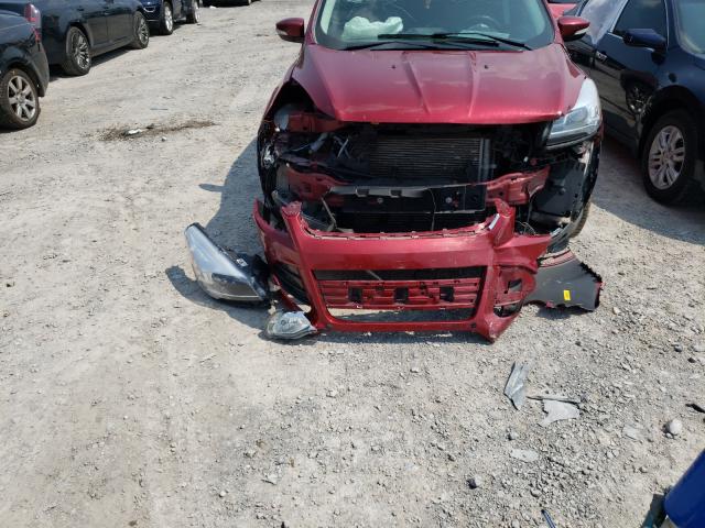 Photo 9 from auction – 2014 FORD ESCAPE TIT with VIN 1FMCU9JX6EUD65862