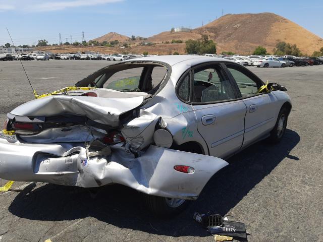 Photo 4 from auction – 1999 FORD TAURUS SE with VIN 1FAFP53U0XG241596