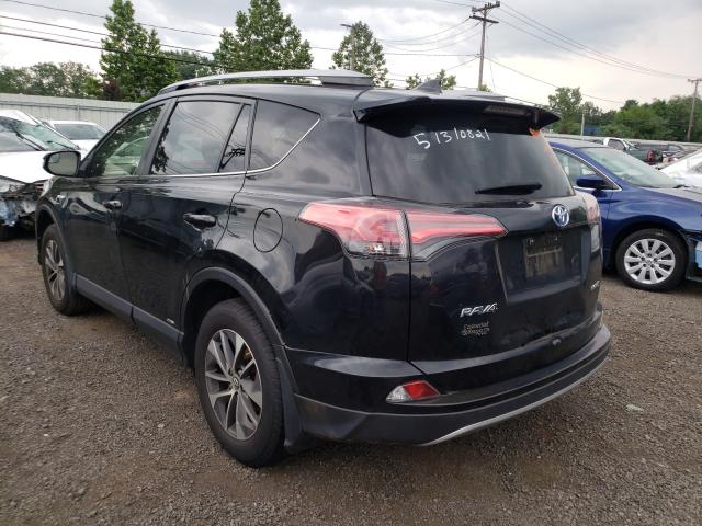 Photo 3 from auction – 2018 TOYOTA RAV4 HV LE with VIN JTMRJREV9JD226335